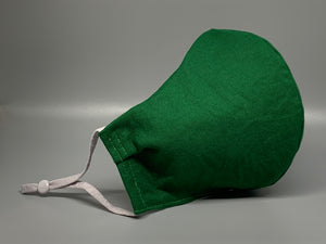 Vibrant solid green cotton. Gray filter pocket. Fabric enclosed nose wire. Comfy adjustable gray elastic earloops. 