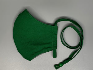 Vibrant solid green cotton. Gray filter pocket. Overhead/Back of Head cotton loop from same fabric. Adjustable Wood Bead for perfect fit. This mask has no nose wire-the adjustable overhead loop gives you a snug fit.