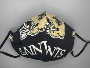 Handmade triple layer cotton facemask. Saints Fans, get your gear! Fabric enclosed nose wire. Black filter pocket. Comfy adjustable black elastic ear loops.