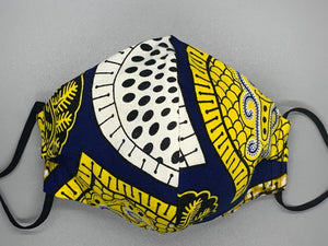 Handmade triple layer cotton facemask. Gorgeous blue, fabric with symbols/pattern in yellow white and black. The ream stated this fabric is from Ghana (or inspired by their amazing prints). Fabric enclosed nose wire. Grey filter pocket. Comfy adjustable black elastic ear loops.  Edit alt text